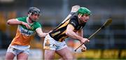 25 February 2024; Eoin Cody of Kilkenny is tackled by Sam Bourke of Offaly during the Allianz Hurling League Division 1 Group A match between Kilkenny and Offaly at UPMC Nowlan Park in Kilkenny. Photo by Ray McManus/Sportsfile