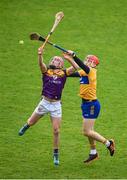 25 February 2024; James Byrne of Wexford in action against Darragh Lohan of Clare during the Allianz Hurling League Division 1 Group A match between Wexford and Clare at Chadwicks Wexford Park in Wexford. Photo by Seb Daly/Sportsfile