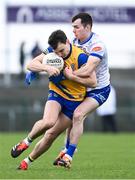 25 February 2024; Conor Hussey of Roscommon in action against Jason Irwin of Monaghan during the Allianz Football League Division 1 match between Roscommon and Monaghan at Dr Hyde Park in Roscommon. Photo by Daire Brennan/Sportsfile