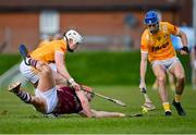 25 February 2024; Conor Whelan of Galway battles for possession against Rory McCloskey, left, and Scott Walsh of Antrim during the Allianz Hurling League Division 1 Group B match between Antrim and Galway at Corrigan Park in Belfast. Photo by Tyler Miller/Sportsfile