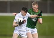 25 February 2024; Ryan Burke of Kildare in action against Mathew Costello of Meath during the Allianz Football League Division 2 match between Meath and Kildare at Páirc Tailteann in Navan, Meath. Photo by Sam Barnes/Sportsfile