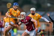 25 February 2024; Jason Flynn of Galway in action against Scott Walsh, left, and Paddy Burke of Antrim during the Allianz Hurling League Division 1 Group B match between Antrim and Galway at Corrigan Park in Belfast. Photo by Tyler Miller/Sportsfile