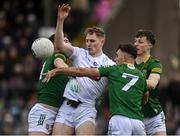 25 February 2024; Daniel Flynn of Kildare in action against Meath players from left, Eoghan Frayn, Sean Coffey and Adam O'Neill during the Allianz Football League Division 2 match between Meath and Kildare at Páirc Tailteann in Navan, Meath. Photo by Sam Barnes/Sportsfile