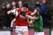 25 February 2024; Colm O'Callaghan of Cork is tackled by Declan McCusker of Fermanagh during the Allianz Football League Division 2 match between Fermanagh and Cork at St Joseph’s Park in Ederney, Fermanagh. Photo by Ben McShane/Sportsfile