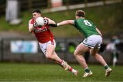 25 February 2024; Rory Maguire of Cork in action against Brandon Horan of Fermanagh during the Allianz Football League Division 2 match between Fermanagh and Cork at St Joseph’s Park in Ederney, Fermanagh. Photo by Ben McShane/Sportsfile