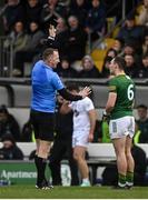 25 February 2024; Darragh Campion of Meath is shown a black card by referee Seamus Mulhare during the Allianz Football League Division 2 match between Meath and Kildare at Páirc Tailteann in Navan, Meath. Photo by Sam Barnes/Sportsfile