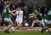 25 February 2024; Alex Beirne of Kildare has a shot on goal under pressure from Brian O'Halloran, right, and Mathew Costello of Meath during the Allianz Football League Division 2 match between Meath and Kildare at Páirc Tailteann in Navan, Meath. Photo by Sam Barnes/Sportsfile
