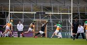25 February 2024; Eoin Cody of Kilkenny, 15, shoots past Offaly goalkeeper Mark Troy to score a goal in the 49th minute during the Allianz Hurling League Division 1 Group A match between Kilkenny and Offaly at UPMC Nowlan Park in Kilkenny. Photo by Ray McManus/Sportsfile