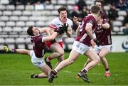 25 February 2024; Eoin McEvoy of Derry in action against Daniel O’Flaherty of Galway  during the Allianz Football League Division 1 match between Galway and Derry at Pearse Stadium in Galway. Photo by Ray Ryan/Sportsfile