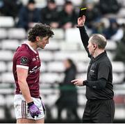 25 February 2024; Referee Derek O'Mahoney gives the black card to Kieran Molloy of Galway during the Allianz Football League Division 1 match between Galway and Derry at Pearse Stadium in Galway. Photo by Ray Ryan/Sportsfile