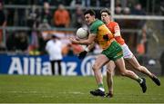 25 February 2024; Michael Langan of Donegal in action against Andrew Murnin of Armagh during the Allianz Football League Division 2 match between Armagh and Donegal at BOX-IT Athletic Grounds in Armagh. Photo by Brendan Moran/Sportsfile