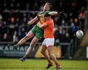 25 February 2024; Hugh McFadden of Donegal in action against Greg McCabe of Armagh during the Allianz Football League Division 2 match between Armagh and Donegal at BOX-IT Athletic Grounds in Armagh. Photo by Brendan Moran/Sportsfile
