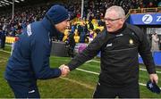 25 February 2024; Wexford manager Keith Rossiter, left, and Clare manager Brian Lohan shake hands after the drawn Allianz Hurling League Division 1 Group A match between Wexford and Clare at Chadwicks Wexford Park in Wexford. Photo by Seb Daly/Sportsfile