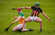 25 February 2024; Charlie Mitchell of Offaly is tackled by Tommy Walsh of Kilkenny during the Allianz Hurling League Division 1 Group A match between Kilkenny and Offaly at UPMC Nowlan Park in Kilkenny. Photo by Ray McManus/Sportsfile