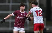 25 February 2024; Sean Kelly of Galway in action against Paul Cassidy of Derry during the Allianz Football League Division 1 match between Galway and Derry at Pearse Stadium in Galway. Photo by Ray Ryan/Sportsfile