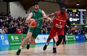 25 February 2024; Matt Treacy of Ireland in action against Michel-Ofik Nzege of Switzerland during the FIBA Basketball World Cup 2027 European Pre-Qualifiers first round match between Ireland and Switzerland at the National Basketball Arena in Tallaght, Dublin. Photo by David Fitzgerald/Sportsfile