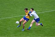 25 February 2024; Enda Smith of Roscommon in action against Killian Lavelle of Monaghan during the Allianz Football League Division 1 match between Roscommon and Monaghan at Dr Hyde Park in Roscommon. Photo by Daire Brennan/Sportsfile