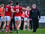 25 February 2024; Cork manager John Cleary with Cork players Ian Maguire, 8, and Colm O'Callaghan after their victory in the Allianz Football League Division 2 match between Fermanagh and Cork at St Joseph’s Park in Ederney, Fermanagh. Photo by Ben McShane/Sportsfile