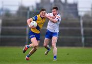 25 February 2024; Dylan Ruane of Roscommon in action against Karl O’Connell of Monaghan during the Allianz Football League Division 1 match between Roscommon and Monaghan at Dr Hyde Park in Roscommon. Photo by Daire Brennan/Sportsfile
