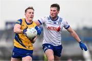 25 February 2024; Eoin McCormack of Roscommon in action against Andrew Woods of Monaghan during the Allianz Football League Division 1 match between Roscommon and Monaghan at Dr Hyde Park in Roscommon. Photo by Daire Brennan/Sportsfile