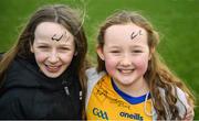 25 February 2024; Roscommon supporters Anna Garvey, left, aged 11, and Saoirse Egan, aged 10, both from Ballintubber in Roscommon, with the signature of Roscommon player Enda Smith on their foreheads, after the Allianz Football League Division 1 match between Roscommon and Monaghan at Dr Hyde Park in Roscommon. Photo by Daire Brennan/Sportsfile