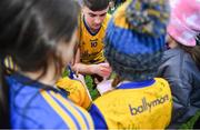 25 February 2024; Robbie Dolan of Roscommon signs autographs after the Allianz Football League Division 1 match between Roscommon and Monaghan at Dr Hyde Park in Roscommon. Photo by Daire Brennan/Sportsfile