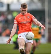 25 February 2024; Rian O'Neill of Armagh kicks a point to give his side the lead in the closing stages of the Allianz Football League Division 2 match between Armagh and Donegal at BOX-IT Athletic Grounds in Armagh. Photo by Brendan Moran/Sportsfile