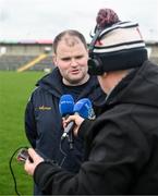 25 February 2024; Roscommon manager Davy Burke is interviewed by Adrian Eames of RTÉ after the Allianz Football League Division 1 match between Roscommon and Monaghan at Dr Hyde Park in Roscommon. Photo by Daire Brennan/Sportsfile