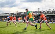 25 February 2024; Patrick McBrearty of Donegal in action against Ciaran Mackin and Aaron McKay of Armagh during the Allianz Football League Division 2 match between Armagh and Donegal at BOX-IT Athletic Grounds in Armagh. Photo by Brendan Moran/Sportsfile