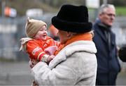 25 February 2024; Suzanne Burns, wife of Uachtarán Chumann Lúthchleas Gael Jarlath Burns, right, with her granddaughter Blaithín, before the Allianz Football League Division 2 match between Armagh and Donegal at BOX-IT Athletic Grounds in Armagh. Photo by Brendan Moran/Sportsfile