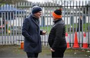 25 February 2024; Uachtarán Chumann Lúthchleas Gael Jarlath Burns, left, in conversation with Armagh County Board chairman Paul McArdle, before the Allianz Football League Division 2 match between Armagh and Donegal at BOX-IT Athletic Grounds in Armagh. Photo by Brendan Moran/Sportsfile