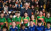 25 February 2024; Uachtarán Chumann Lúthchleas Gael Jarlath Burns meets young players from Our Lady's & St Mochua's PS and St Laurence O'Toole's Belleek during half-im in the Allianz Football League Division 2 match between Armagh and Donegal at BOX-IT Athletic Grounds in Armagh. Photo by Brendan Moran/Sportsfile