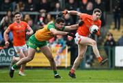 25 February 2024; Andrew Murnin of Armagh is tackled by Caolan McGonagle of Donegal during the Allianz Football League Division 2 match between Armagh and Donegal at BOX-IT Athletic Grounds in Armagh. Photo by Brendan Moran/Sportsfile