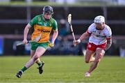 24 February 2024; Conor Gartland of Donegal and Ben Gormley of Tyrone during the Allianz Hurling League Division 2 Group B match between Tyrone and Donegal at O'Neills Healy Park in Omagh, Tyrone. Photo by Ben McShane/Sportsfile