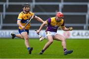 25 February 2024; Conor Hearne of Wexford in action against Ian Galvin of Clare during the Allianz Hurling League Division 1 Group A match between Wexford and Clare at Chadwicks Wexford Park in Wexford. Photo by Seb Daly/Sportsfile