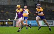 25 February 2024; Damien Reck of Wexford in action against David Fitzgerald of Clare during the Allianz Hurling League Division 1 Group A match between Wexford and Clare at Chadwicks Wexford Park in Wexford. Photo by Seb Daly/Sportsfile