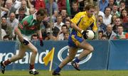18 July 2004; David Casey, Roscommon, in action against James Nallen, Mayo. Bank of Ireland Connacht Senior Football Championship Final, Mayo v Roscommon, McHale Park, Castlebar, Co. Mayo. Picture credit; Pat Murphy / SPORTSFILE
