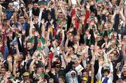 18 July 2004; Mayo and Roscommon fans cheer on their sides during the game. Bank of Ireland Connacht Senior Football Championship Final, Mayo v Roscommon, McHale Park, Castlebar, Co. Mayo. Picture credit; Pat Murphy / SPORTSFILE