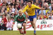 18 July 2004; Conor Mortimer, Mayo, in action against John Whyte, Roscommon. Bank of Ireland Connacht Senior Football Championship Final, Mayo v Roscommon, McHale Park, Castlebar, Co. Mayo. Picture credit; Pat Murphy / SPORTSFILE