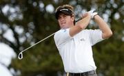 21 July 2004; Graeme McDowell watches his tee shot from the 17th tee box during the first round. Nissan Irish Open Golf Championship, County Louth Golf Club, Baltray, Co. Louth. Picture credit; Matt Browne / SPORTSFILE