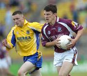 18 July 2004; Sean Armstrong, Galway, in action against Thomas Bannion, Roscommon. Connacht Minor Football Championship Final, Galway v Roscommon, McHale Park, Castlebar, Co. Mayo. Picture credit; Damien Eagers / SPORTSFILE