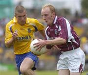 18 July 2004; Shane Hogan, Galway, in action against Jason Carney, Roscommon. Connacht Minor Football Championship Final, Galway v Roscommon, McHale Park, Castlebar, Co. Mayo. Picture credit; Damien Eagers / SPORTSFILE