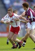 17 July 2004; Michael Coleman, Tyrone, in action against Kieran Fitzgerald, Galway. Bank of Ireland Senior Football Championship Qualifier, Round 3, Tyrone v Galway, Croke Park, Dublin. Picture credit; Ray McManus / SPORTSFILE