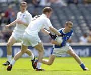 18 July 2004; Kevin Smith, Laois, in action against John Fogarty, Kildare. Leinster Minor Football Championship Final, Laois v Kildare, Croke Park, Dublin. Picture credit; Ray McManus / SPORTSFILE
