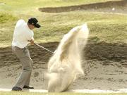 23 July 2004; James Kingston blasts from the bunker onto the 9th fairway during the second round. Nissan Irish Open Golf Championship, County Louth Golf Club, Baltray, Co. Louth. Picture credit; Matt Browne / SPORTSFILE