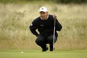 23 July 2004; Padraig Harrington lines up a putt on the 16th green during the second round. Nissan Irish Open Golf Championship, County Louth Golf Club, Baltray, Co. Louth. Picture credit; Matt Browne / SPORTSFILE