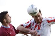 23 July 2004; Clive Delaney, Derry City, in action against  Barry Moran, Galway United. FAI Carlsberg Cup, Second Round, Galway United v Derry City, Terryland Park, Galway. Picture credit; David Maher / SPORTSFILE