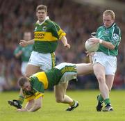 11 July 2004; Stephen Kelly, Limerick, in action against Tomas O'Se, Kerry. Bank of Ireland Munster Senior Football Championship Final, Limerick v Kerry, Gaelic Grounds, Limerick. Picture credit; Brendan Moran / SPORTSFILE