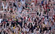 18 July 2004; Mayo and Roscommon supporters during the Mexican Wave at half time. Bank of Ireland Connacht Senior Football Championship Final, Mayo v Roscommon, McHale Park, Castlebar, Co. Mayo. Picture credit; Damien Eagers / SPORTSFILE
