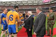 8 September 2013; President of Ireland Michael D. Higgins, accompanied by Uachtarán Chumann Lúthchleas Gael Liam Ó Néill, is greeted by Clare captain Patrick Donnellan before the game. GAA Hurling All-Ireland Senior Championship Final, Cork v Clare, Croke Park, Dublin. Picture credit: Brendan Moran / SPORTSFILE